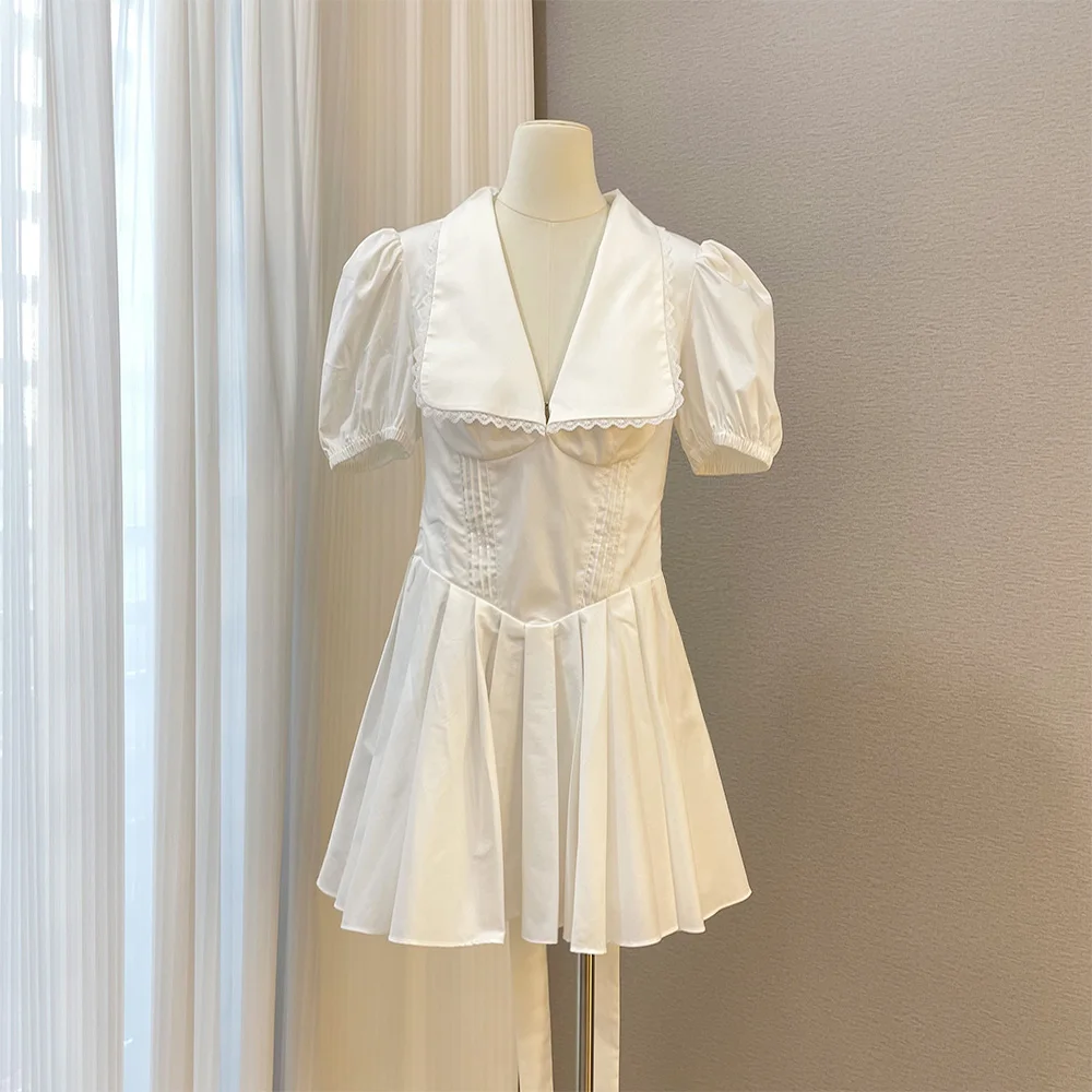 

American niche French V-neck bubble sleeve lace lace bow tie first love little white dresses