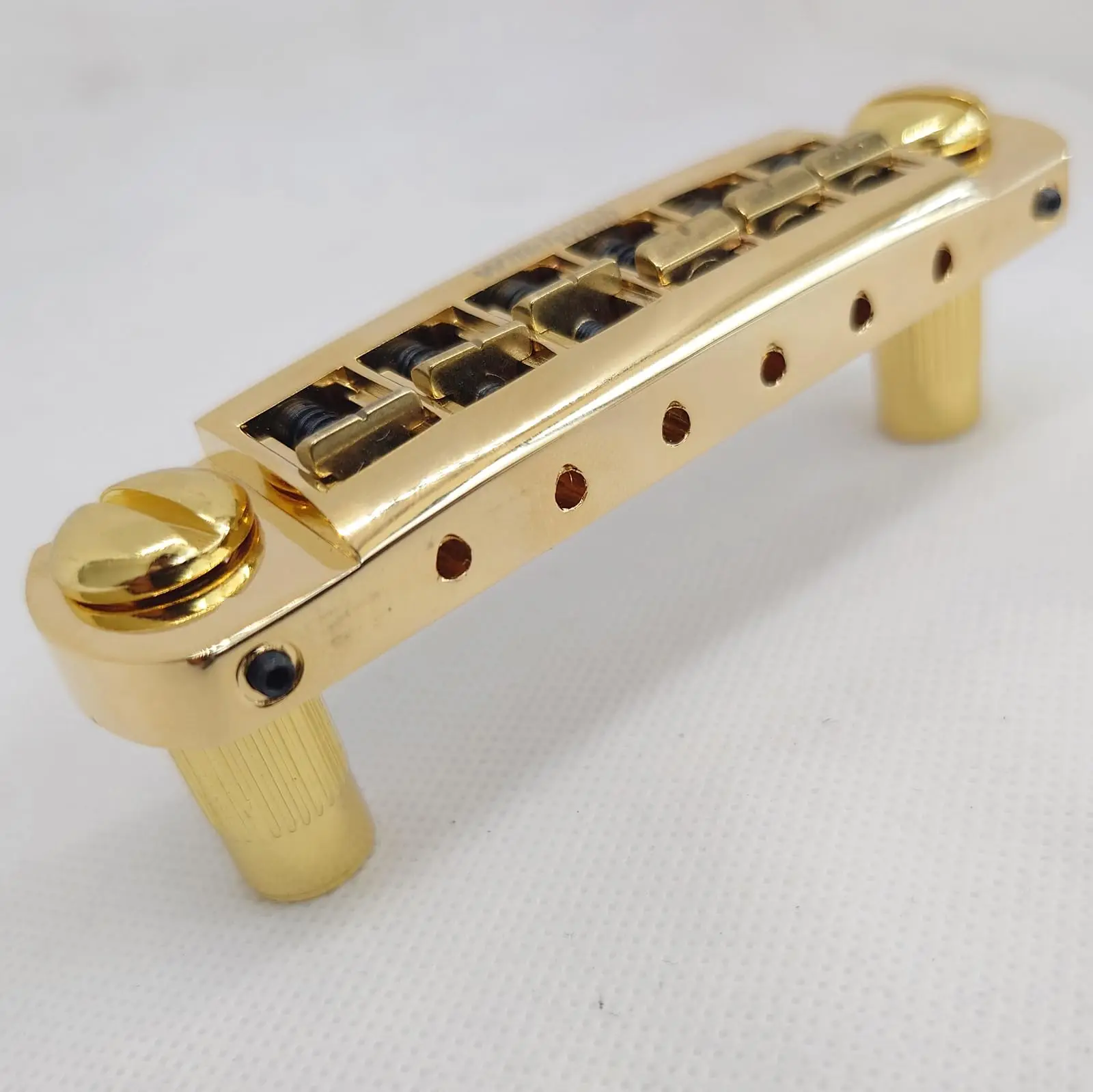 

Guitar Bridge 52.5mm(2-1/16 Inch) Adjustable Pigtail Style Wraparound Bridge Tailpiece for Les Paul Junior SG Style Guitar