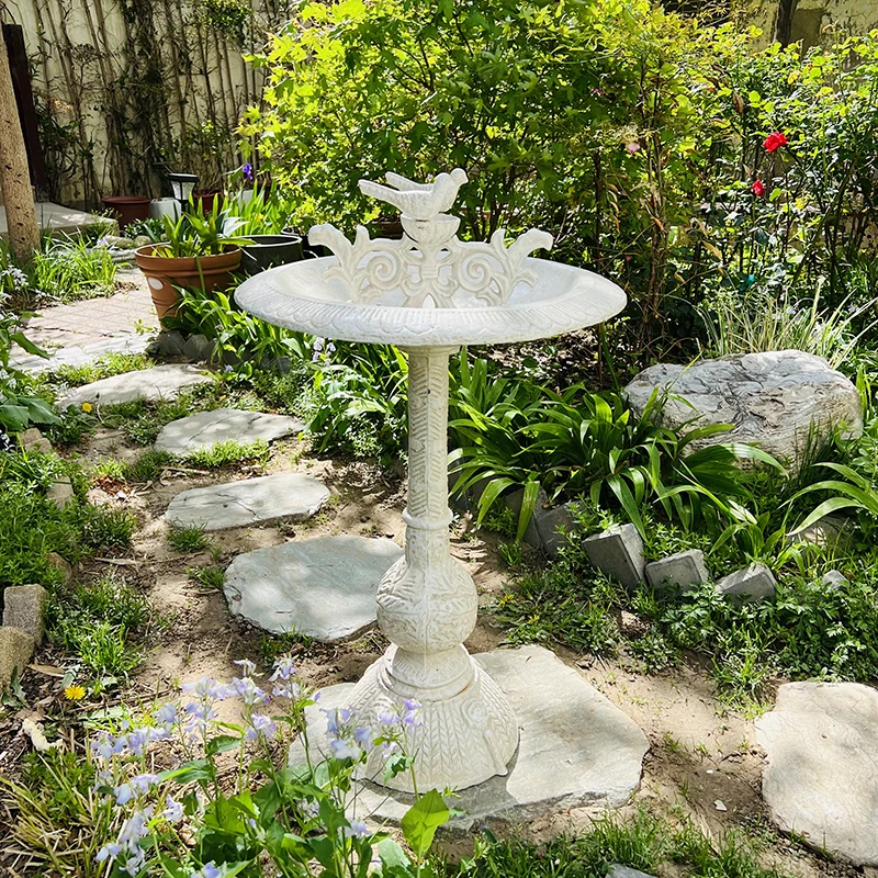

Gardening ornaments, cast iron old bird food pots, garden decoration