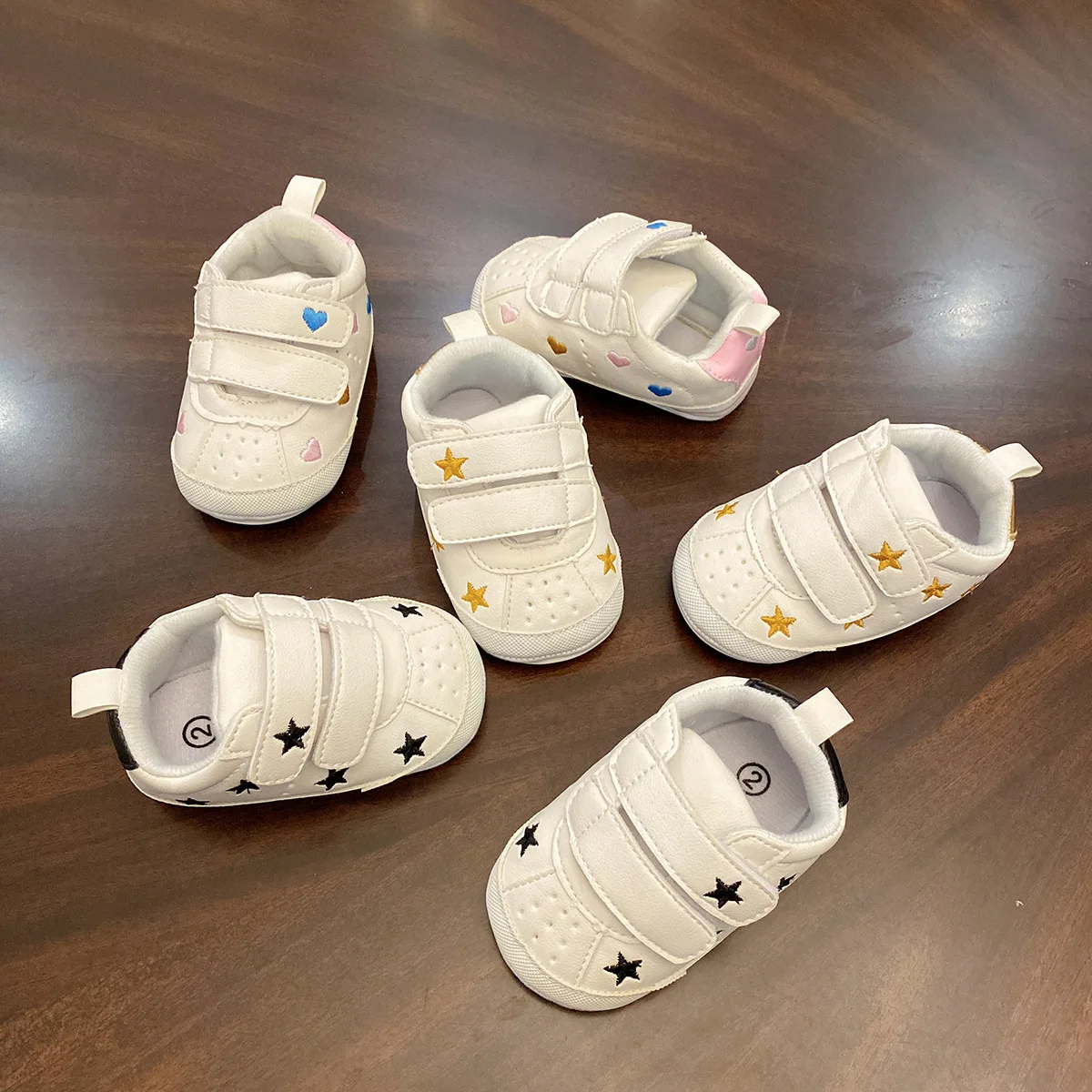 Primavera y otoño nuevo 0-1 año niño y niña bebé suela suave superficie suave zapatos blancos zapatos para niños recién nacidos