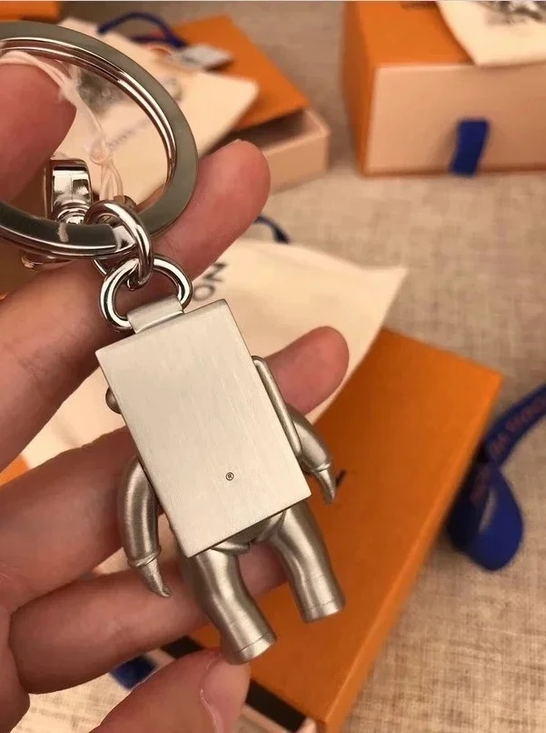 새로운 티타늄 강철 우주 비행사 키 체인 우주 비행사 펜던트 작은 선물 자동차 키 체인 만화 인형 키 체인 펜던트