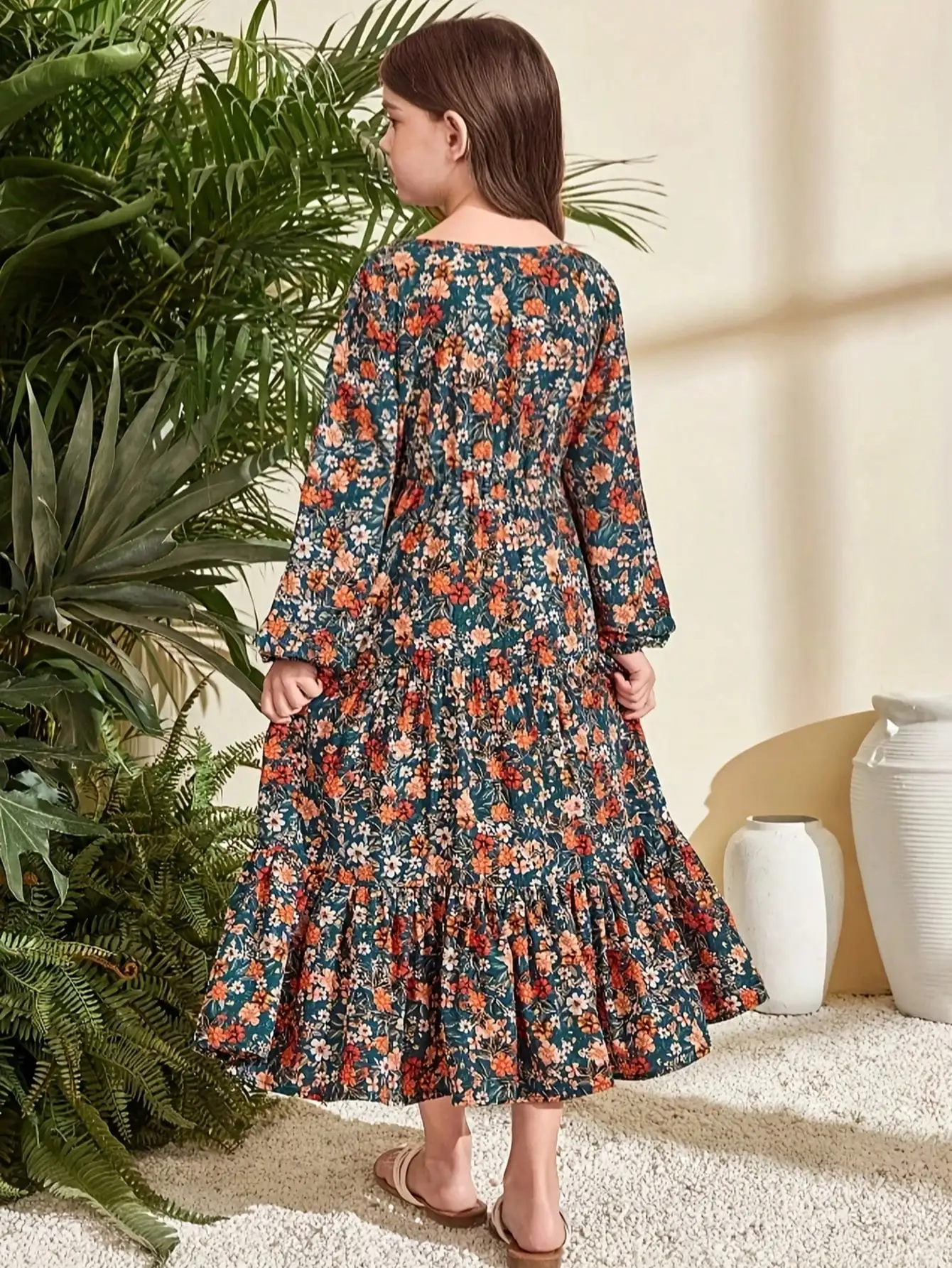 Floral V-neck Long Sleeved Jumpsuit, Elegant Green with Vibrant Floral Print, Ruffled Hem, Cinched Waist Design