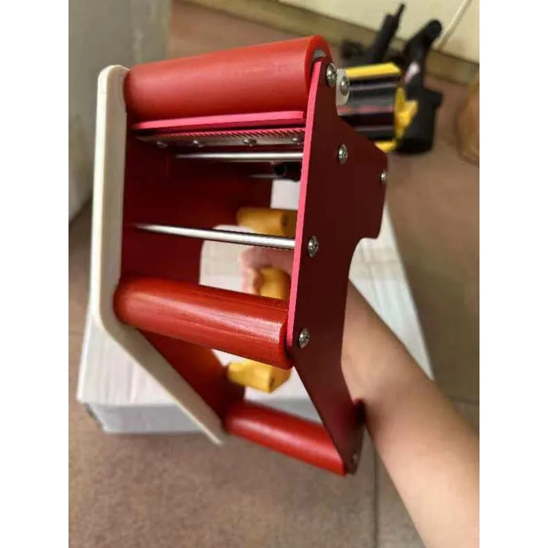 Film sticking machine for doors and windows. Manual operation is convenient for film sticking