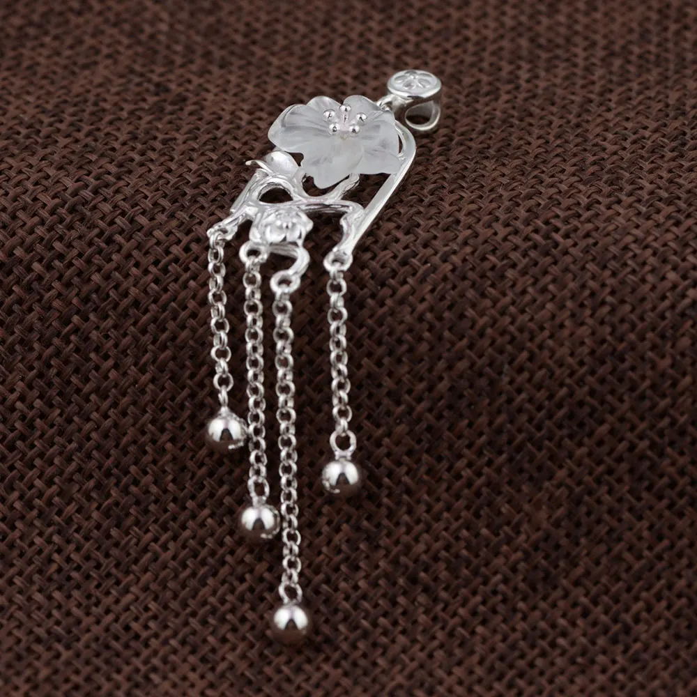 

Кулон в виде цветка из серебра 925 пробы с белым цирконием