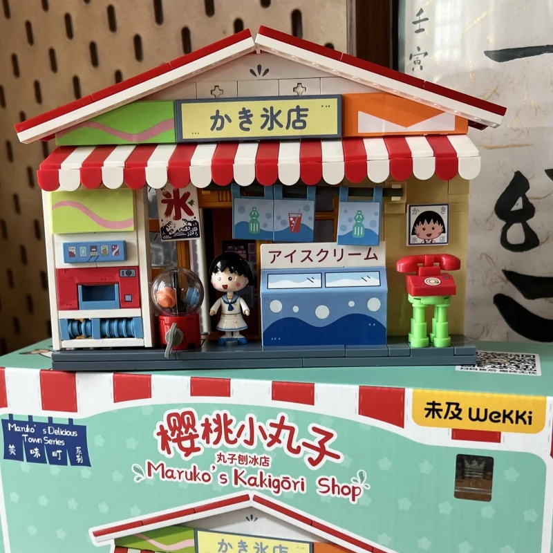 Wekki Bausteine Chibi Maruko Chan Köstliche Stadt Straßenansicht Laden Montage-Puzzle Spielzeugmodelle Dekoration Geschenk Spielzeuge