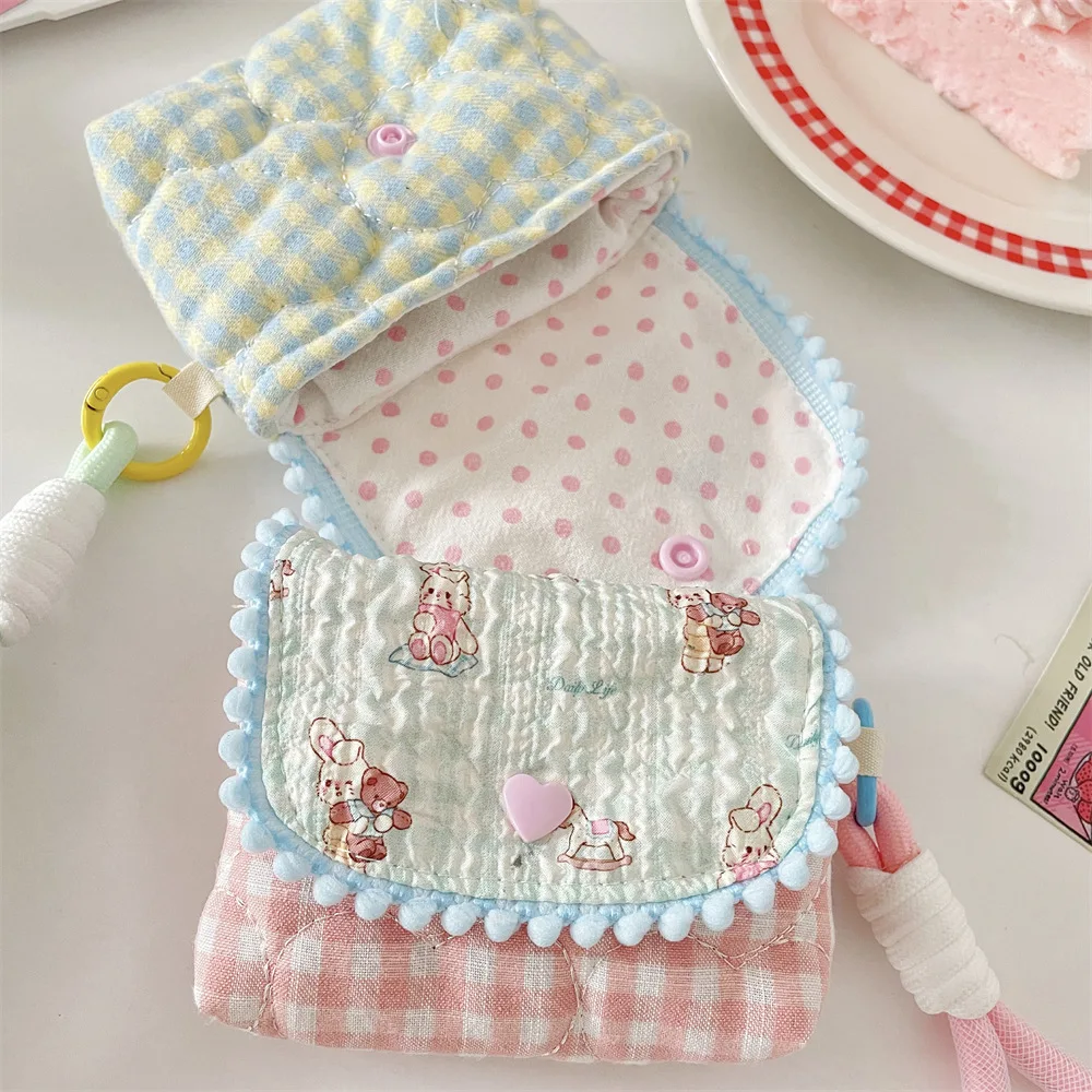 กระเป๋าใส่เหรียญผ้าฝ้ายลายดอกไม้สไตล์เกาหลีสำหรับผู้หญิง น่ารัก เหมาะสำหรับนักเรียน ใส่บัตร เหรียญ หูฟัง กระเป๋าเก็บของขนาดเล็กพกพาสะดวก