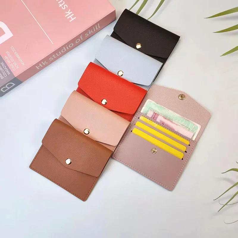 ผู้ชายผู้หญิง Bank บัตรเครดิต ID รถบัสผู้ถือบัตร Travel Card Organizer หนังสีทึบ Multi-Card Slot แบบพกพา