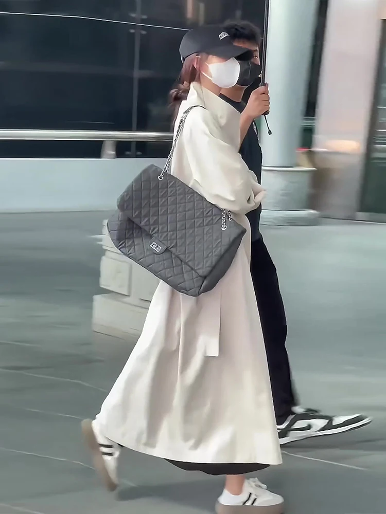 เสื้อโค้ทผู้หญิงสีเบจ สไตล์ลำลอง สำหรับฤดูใบไม้ร่วงและฤดูหนาว ทรงยาว คอตั้ง ติดกระดุมสองแถว ทรงหลวม สไตล์สบายๆ แฟชั่นลำลอง