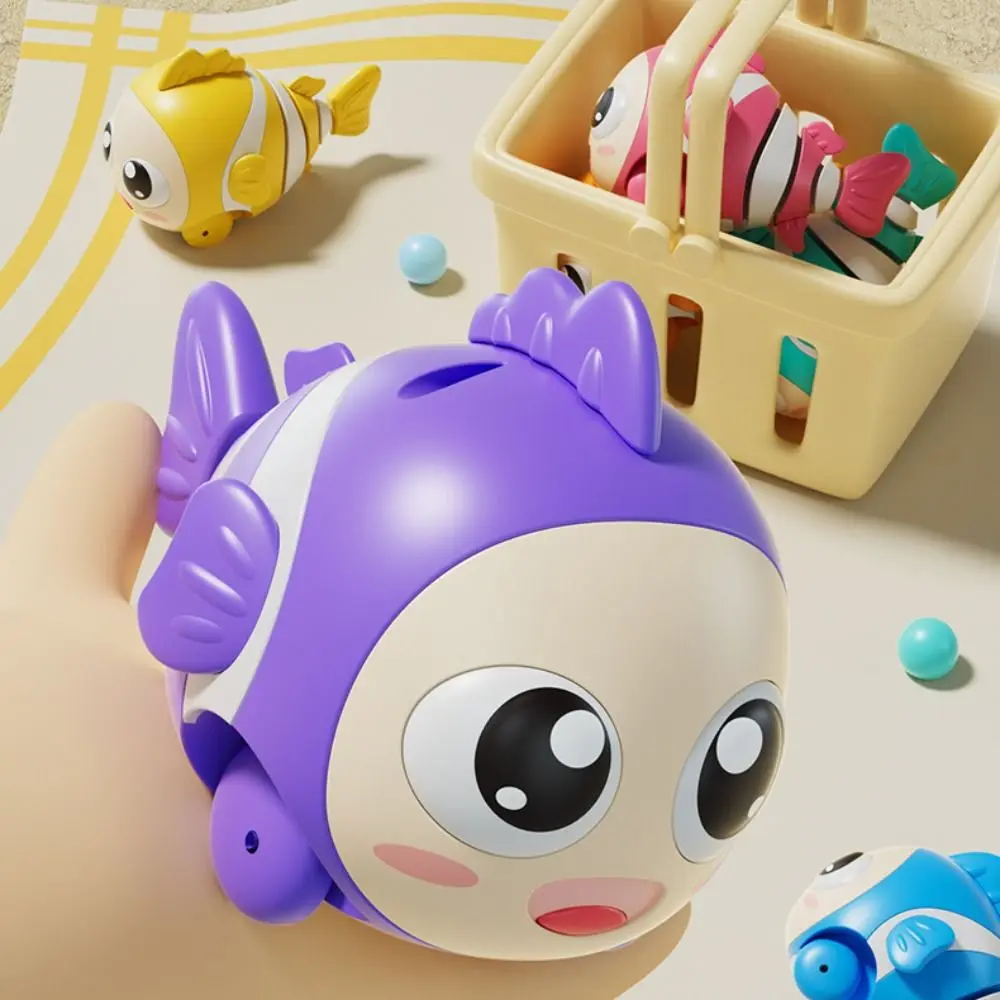 Guida elettrica strisciante per bambini Giocattoli a forma di pesce Educazione precoce Suono Camminare Giocattolo per bambini Musica Sensoriale Pesce strisciante Giocattoli per bambini