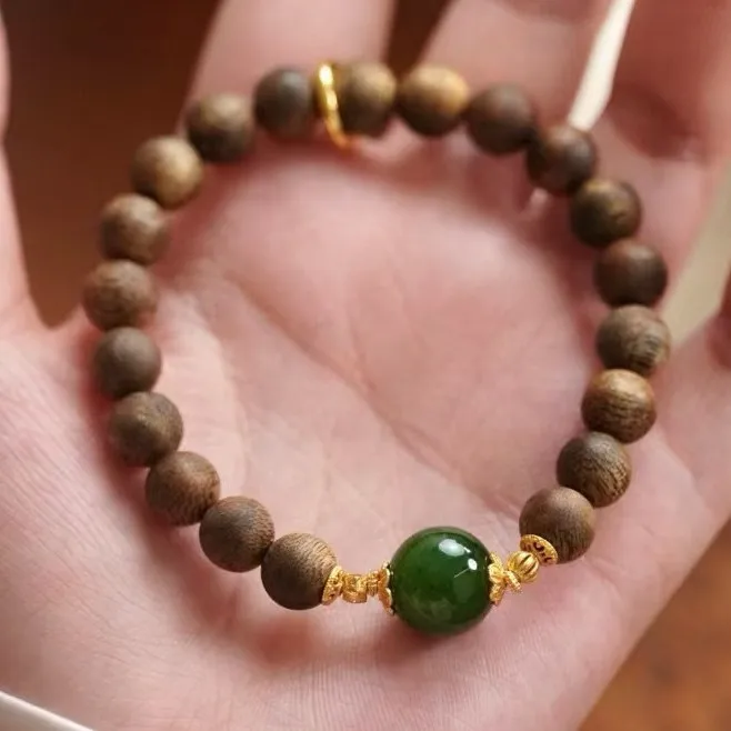 

Natural Sinking Grade Agarwood Bracelet with Gold Fortune Running Ring for Men and Women Gifts