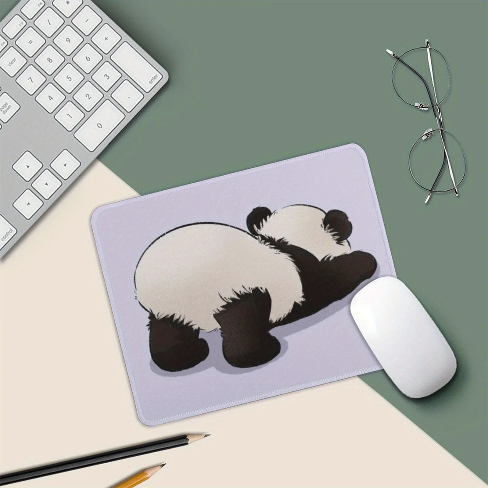 

The cute panda lying on the ground mouse pad is a high-quality computer desktop decoration suitable for gamers and families