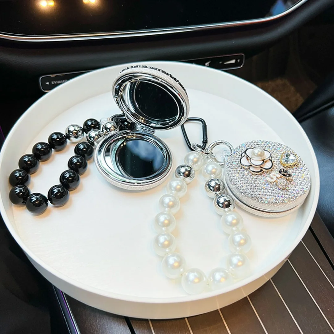 Przenośne składane lusterko w torebce, lusterko do makijażu do noszenia w ręce, brelok do kluczy z lusterkiem w kształcie kwiatka do samochodu.