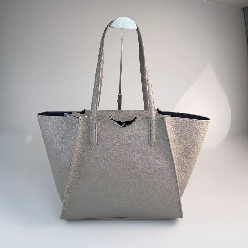 新しいウィングス大容量トートバッグ、女性用、ファッションハンドヘルド、シンプルで多用途な通勤バッグ、本革の質感