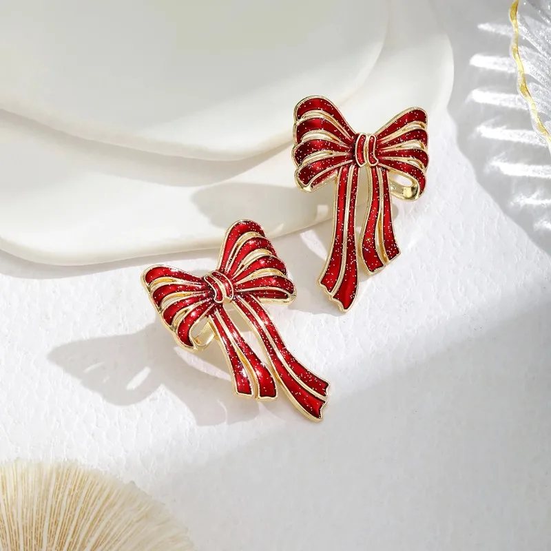 A Pair of Fashionable New Red Bow Earrings Environmentally Friendly Alloy Dripping Oil Creative Earrings Christmas Earrings