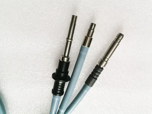 Surgical optical fiber cable endoscopy light source connector