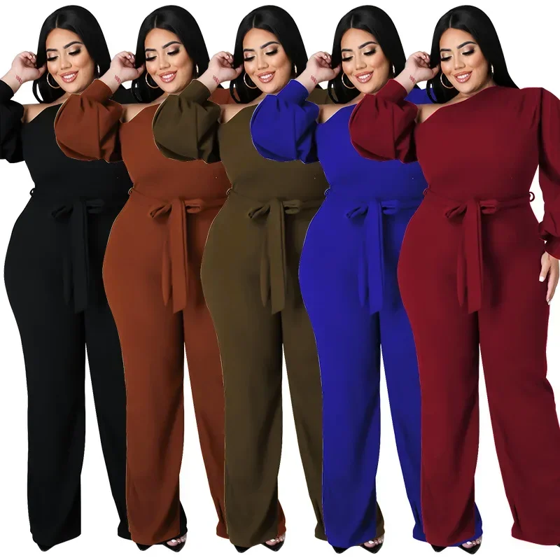 European and American plus size women's solid color lantern sleeves with sloping shoulders and waist belt fashionable jumpsuit