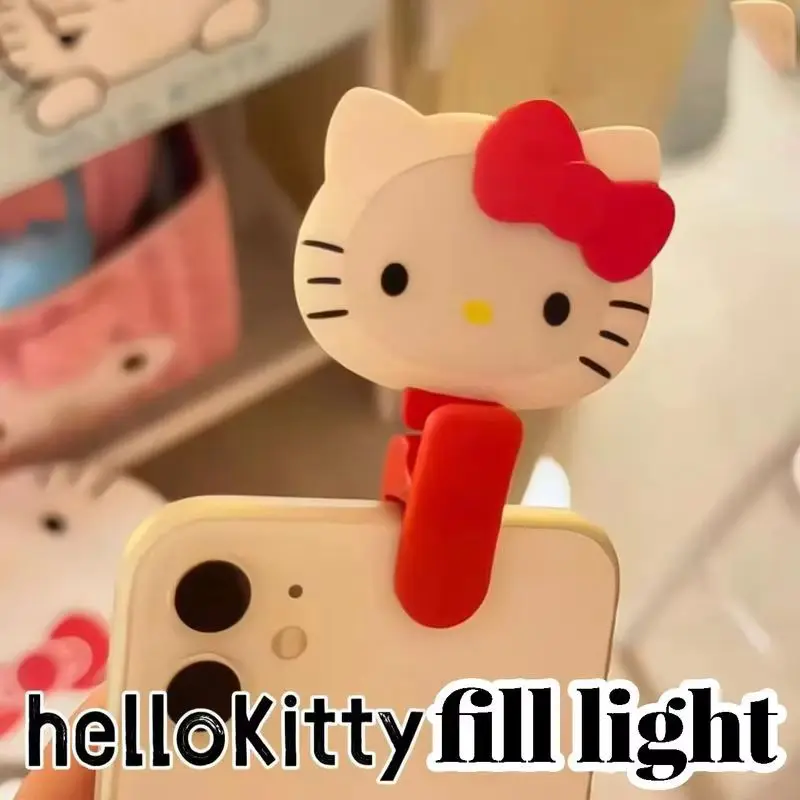 

Новая маленькая и изящная мультяшная светящаяся игрушка Hello Kitty, миниатюрный портативный светильник для селфи, атмосферная подсветка для девочек.