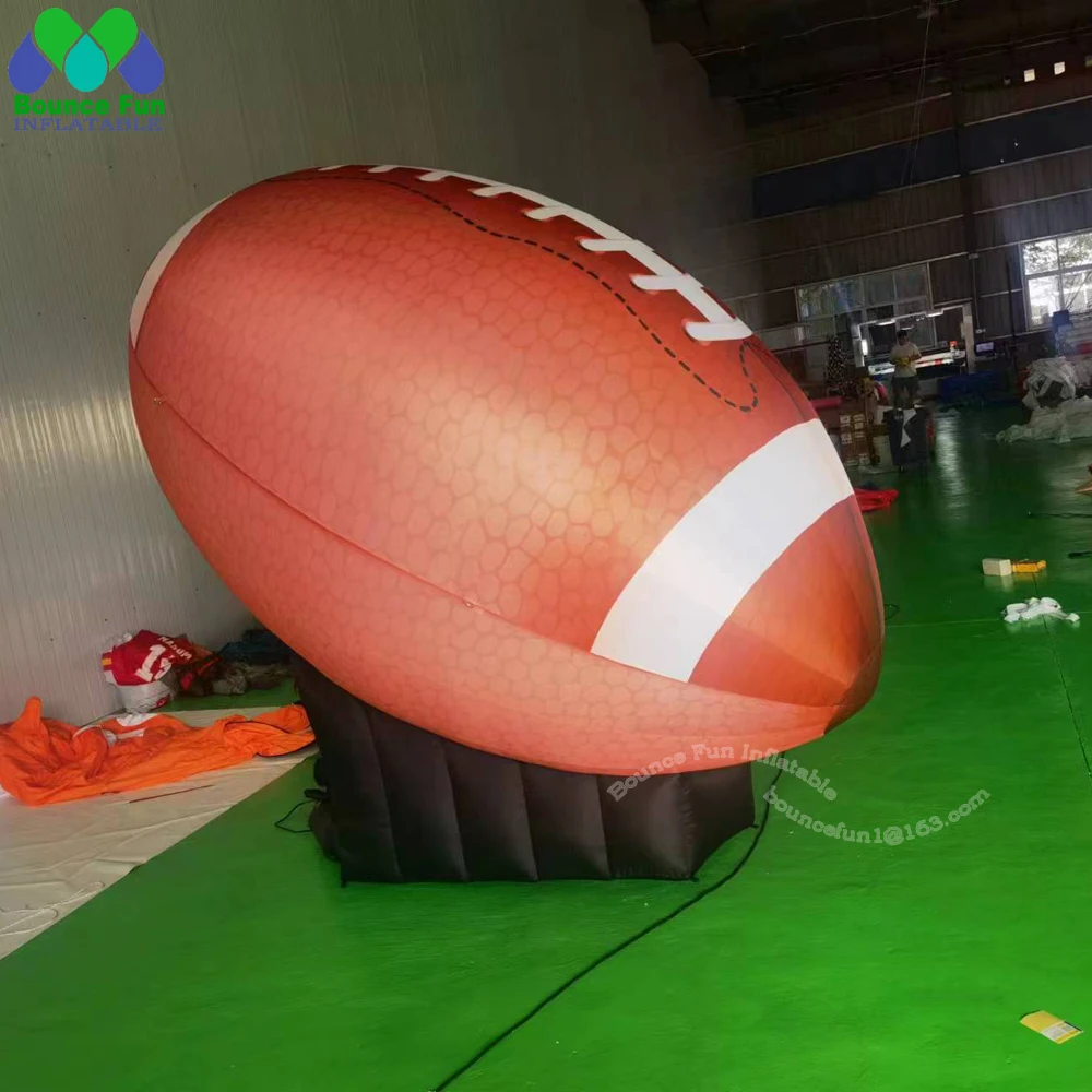 Best Quality Giant Inflatable Rugby Ball With Base Inflatable American Football For Sports Events Advertising