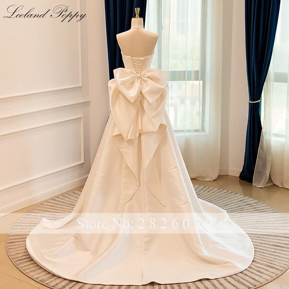 Lceland Poppy Elegant A Line Court Train Satin Wedding Dresses Sleeveless Pleated Bridal Gowns with Bow Knot