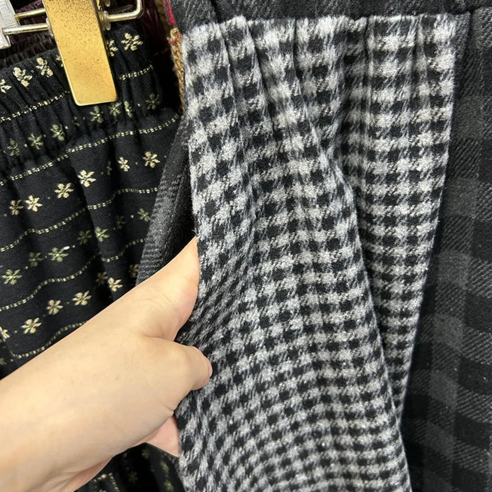 Nieuw in dames herfst winter onregelmatige geruite midi-rok 2025, vrouwelijke Koreaanse stijl, elegante hoge taille rokken