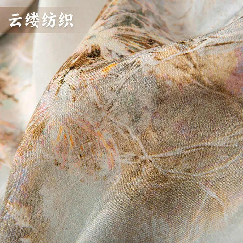 Silk double crepe printed fabric with artistic patterns and cold-toned base color women's