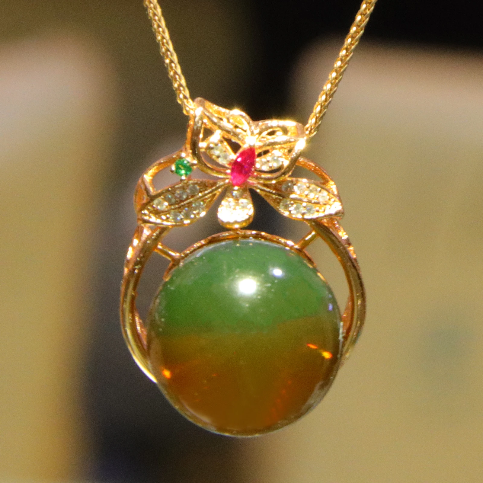 

Natural Color Shift Blue Amber Pendant 17mm in Gold Plated Flower Setting with Rainbow Zircon Stones Sterling Silver Necklace