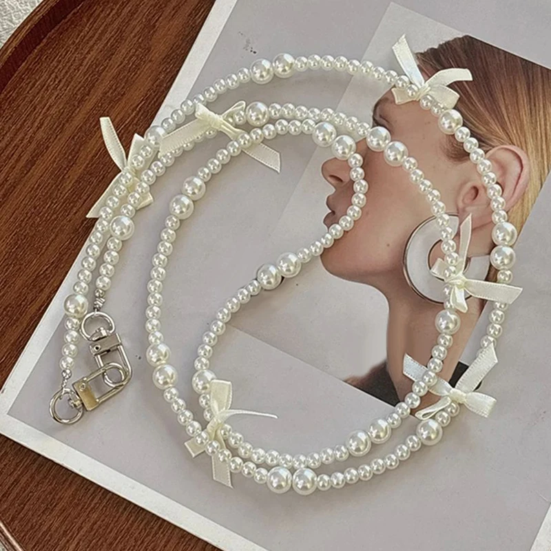 Universele anti-verloren telefoonkoord patchpakking lange crossbody parelboog mobiele telefoonketting dames lange nek- en schouderriem