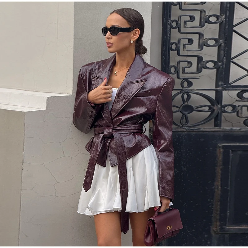 2025 otoño Y2K chaqueta de cuero roja para mujer estilo callejero solapa holgada de manga larga con cinturón abrigo femenino con cordones prendas de vestir exteriores locomotora