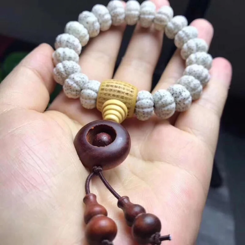 

Natural high-polish 12mm pumpkin beads star-moon bracelet paired with a boxwood heart-sutra connector and a rosewood fortune rin