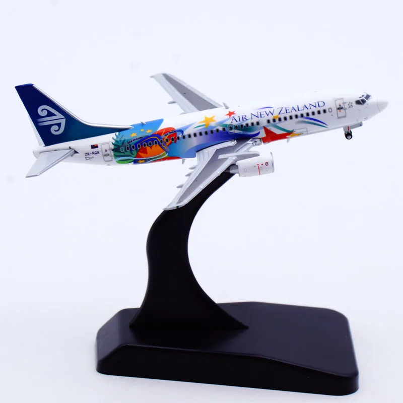 XX4969 โลหะผสมสะสมเครื่องบินของขวัญ JC Wings 1:400 Air นิวซีแลนด์ "StarAlliance" โบอิ้ง B737-300 เครื่องบิน Diecast รุ่น ZK-NGA