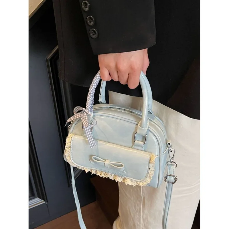 

2025 Designer Bow Bag Niche Bowling Purse for Women Elegant Top Handle Crossbody Bag Spring/Summer Fashion Tote