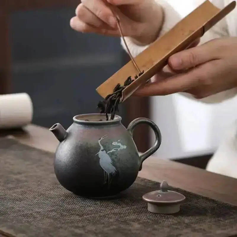 Los hornos de estilo chino se transforman en grullas de colores, presenta una auspicidad. Teteras Western Shi, cerámica rugosa, té de kung fu