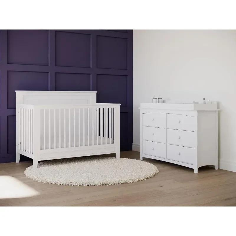 La cuna convertible Storkcraft Solstice 5 en 1 se convierte en la cama de niño y la cama de tamaño completo se adapta al colchón de cuna estándar de tamaño completo