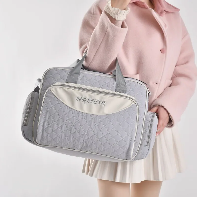 New Practical Mom Bag with Geometric Embossing and Large Capacity for Mom and Baby Bags Travel Breastfeeding Mom Bag Handbags