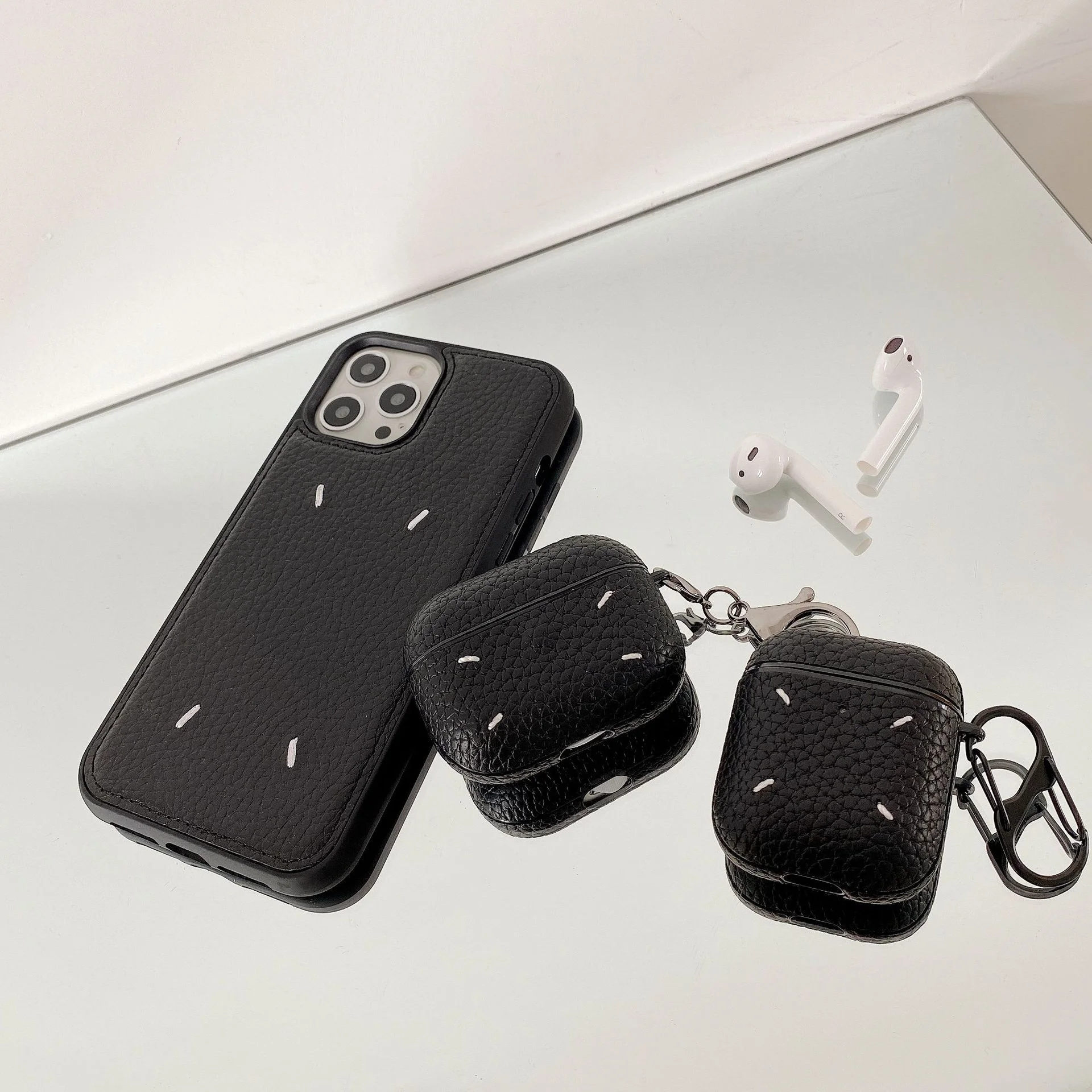 

Black lychee leather for Apple AirPods protective cover 1st, 2nd and 3rd generation wireless Bluetooth headset cover