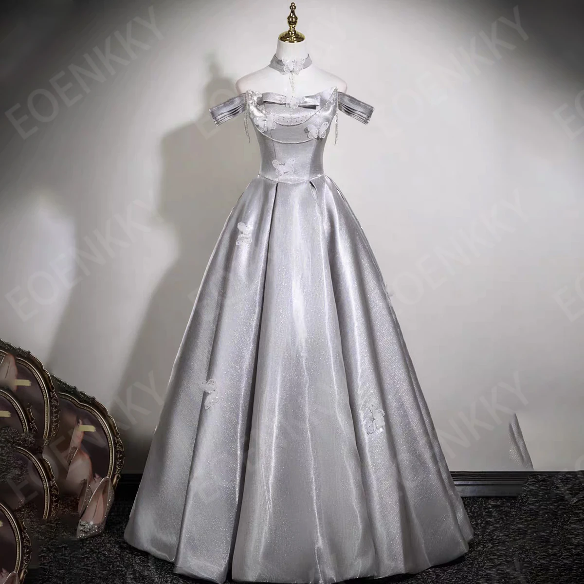 

EOENKKY Sparkly Silver Prom Dresses Woman Butterfly Off Shoulder Beaded A Line Party Dress Floor Length Customized فساتين سهرات