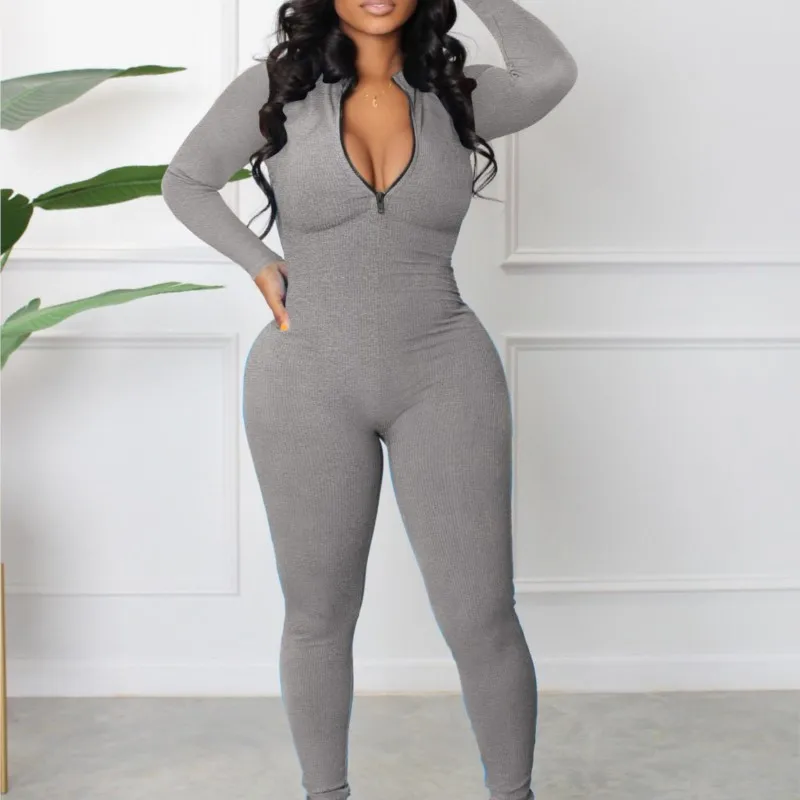 بدلة قفز مضلعة بلون سادة للنساء بأكمام طويلة بتصميم سحاب نحيف غير رسمي نمط رياضي مجموعة خريف جديدة Macacão Feminino