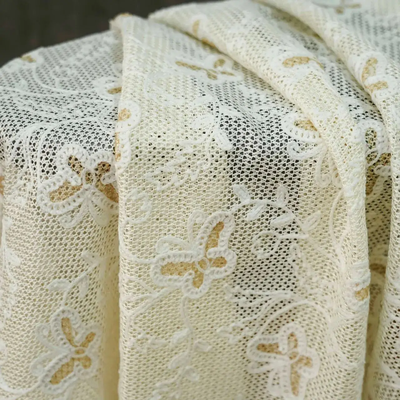 

High-quality apricot-colored butterfly floral embroidered fabric for women's clothing home decor fashionable designer fabric