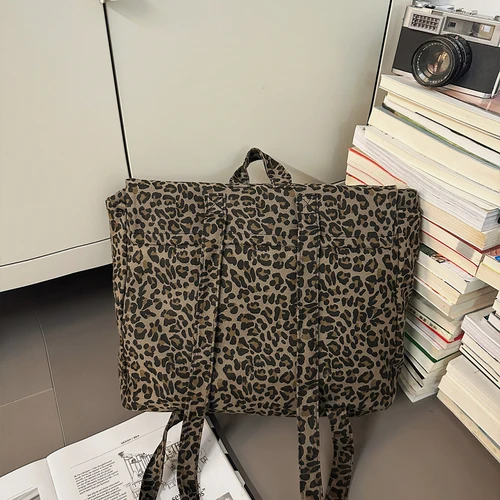 Imagen 2 del producto Mochila de lona con estampado de leopardo versión coreana 2025, nueva mochila de viaje de gran capacidad para primavera/verano, mochila para estudiantes