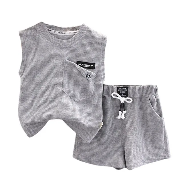 Nowe letnie dziewczynek ubrania dla dzieci chłopcy kamizelka spodenki 2 sztuk/zestawów stroje dla niemowląt maluch Casual kostium sportowy dla dzieci dresy