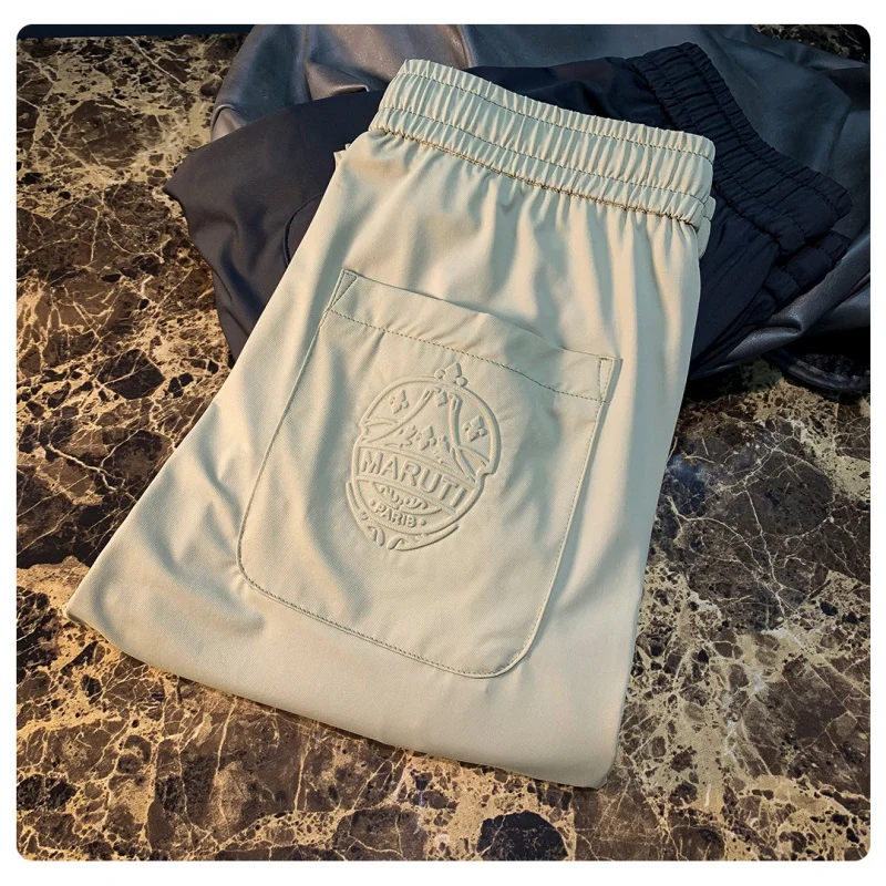 

Summer ice silk casual pants for men, trendy embroidery drawstring sports and casual versatile quick drying pants