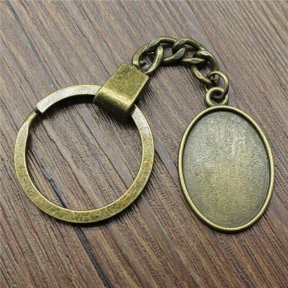 Moda antyczny brąz kolor pasuje 18x25mm owalny styl klasyczny Cameo Cabochon wisiorek baza ustawienie brelok do kluczy Making
