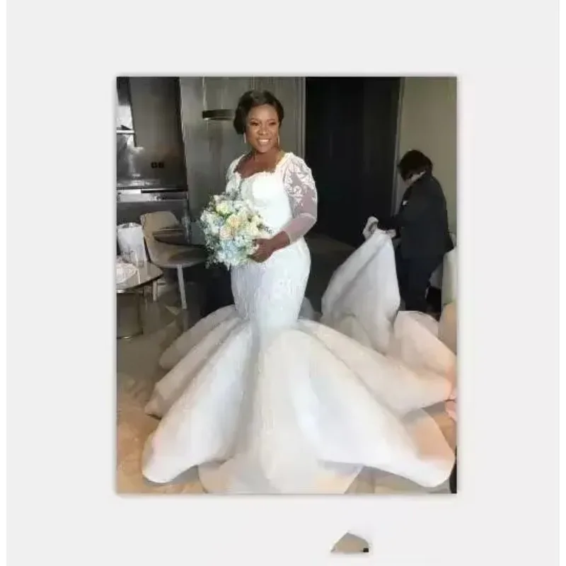 

Customized African Mermaid Plus Size Wedding Dresses Sequins Lace Appliques Illusion Long Sleeves Sheer Back Sexy Luxury