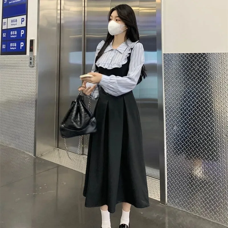 Abito camicia a righe snellente Stile falso in due pezzi Tendenza universitaria che asciuga l'età Autunno Inverno Moda internazionale transfrontaliera