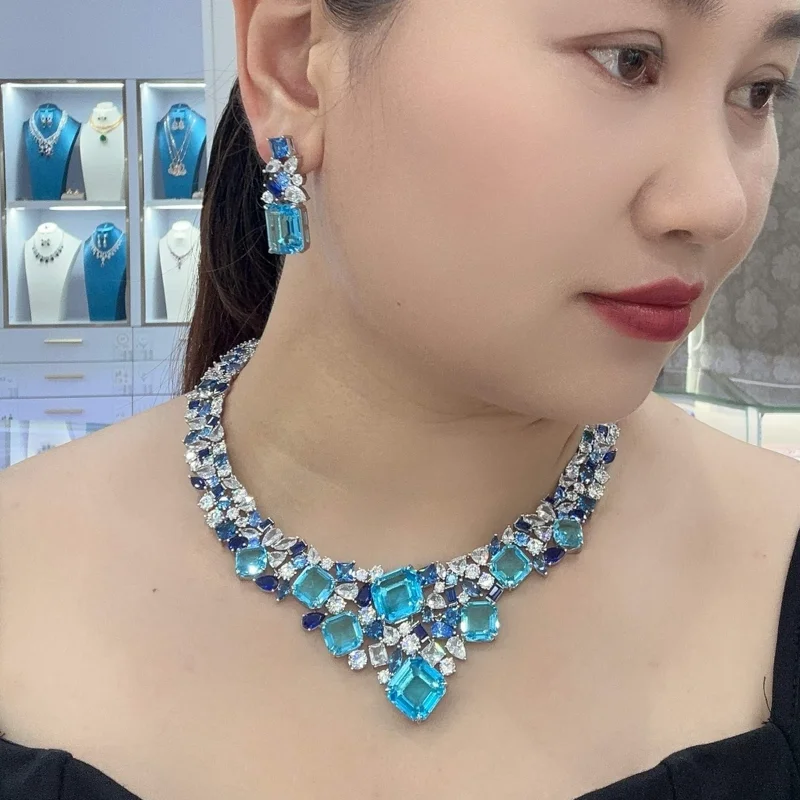 

Дизайнерская коллекция Стиль Серьги Ожерелье Женщины Леди Инкрустация Розовый Фиолетовый Синий Желтый Квадратный Циркон Наборы Ювелирных Изделий Для Вечеринки