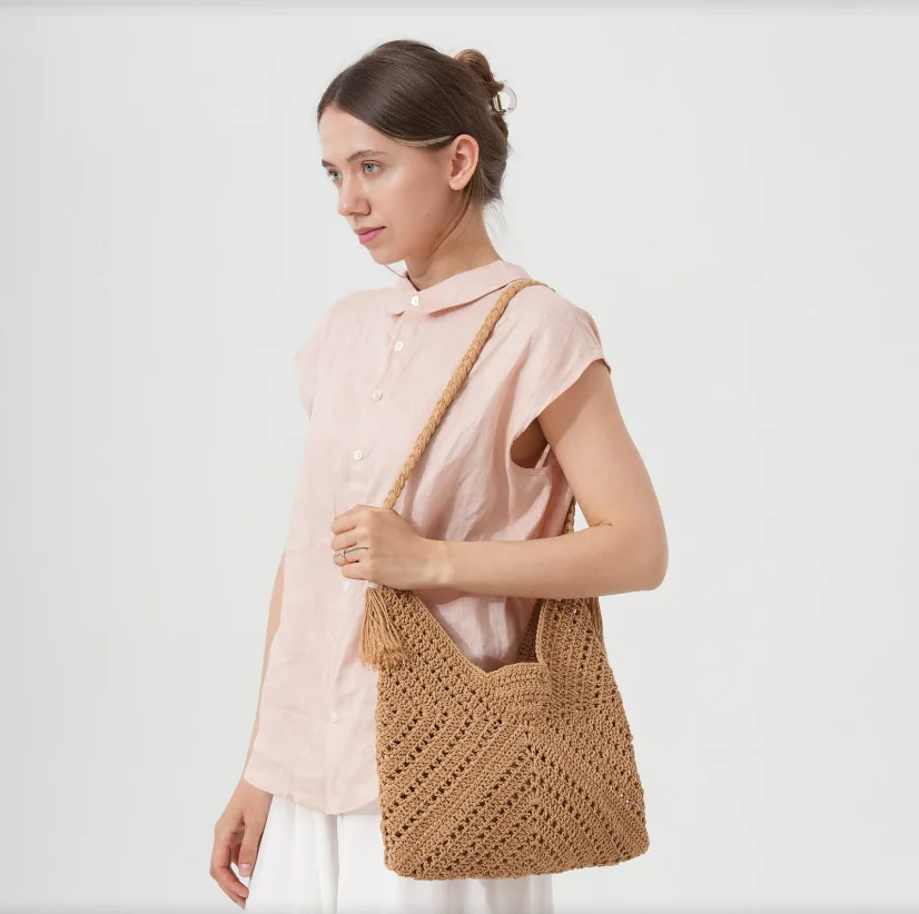 

Women Crochet Tote Bag Fashion Knitted Bag Large Capacity Hollow Out Bag Solid Color Tassels Woven Shoulder Beach Tote 2025