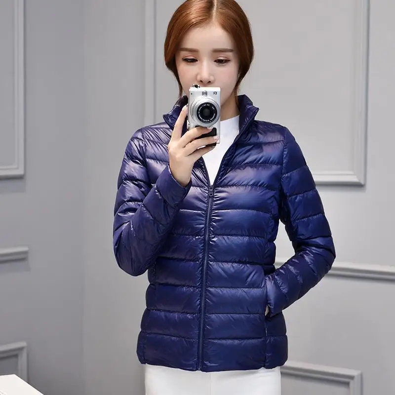 

Новая осенне-зимняя легкая пуховая куртка из хлопка для женщин, с капюшоном, приталенная, тонкая, разноцветная, больших размеров, с воротником-стойкой...