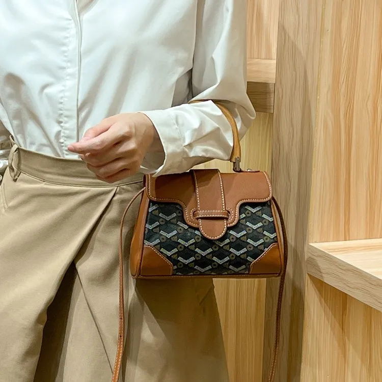 2025 حقيبة سايجون نسائية بمقبض خشبي من الجلد الطبيعي على شكل زهرة عبر الحدود حقيبة كيلي للركاب الجديدة