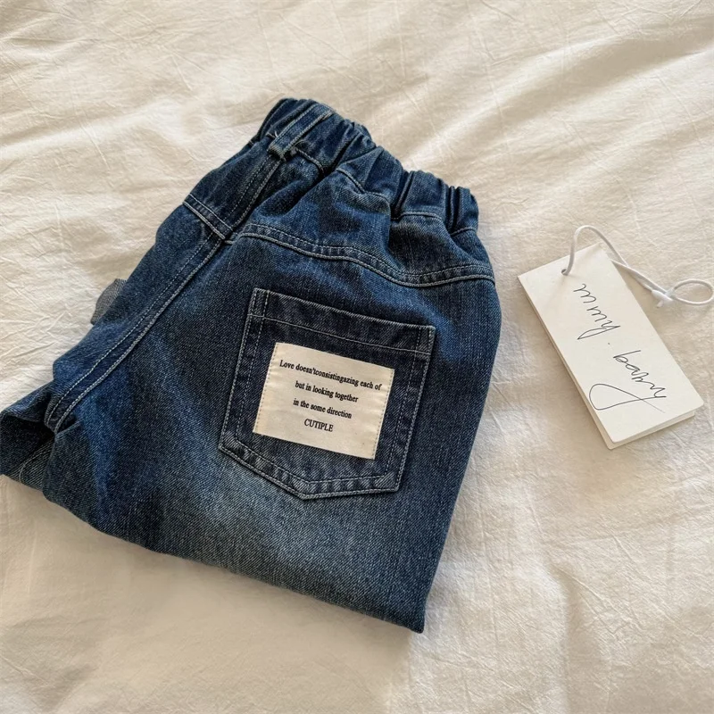 Pantaloni jeans per bambini Pantaloni primaverili e autunnali Pantaloni elasticizzati per ragazzi 2025 Pantaloni per piedi con stampa allentata per bambini nuovi 2-8T
