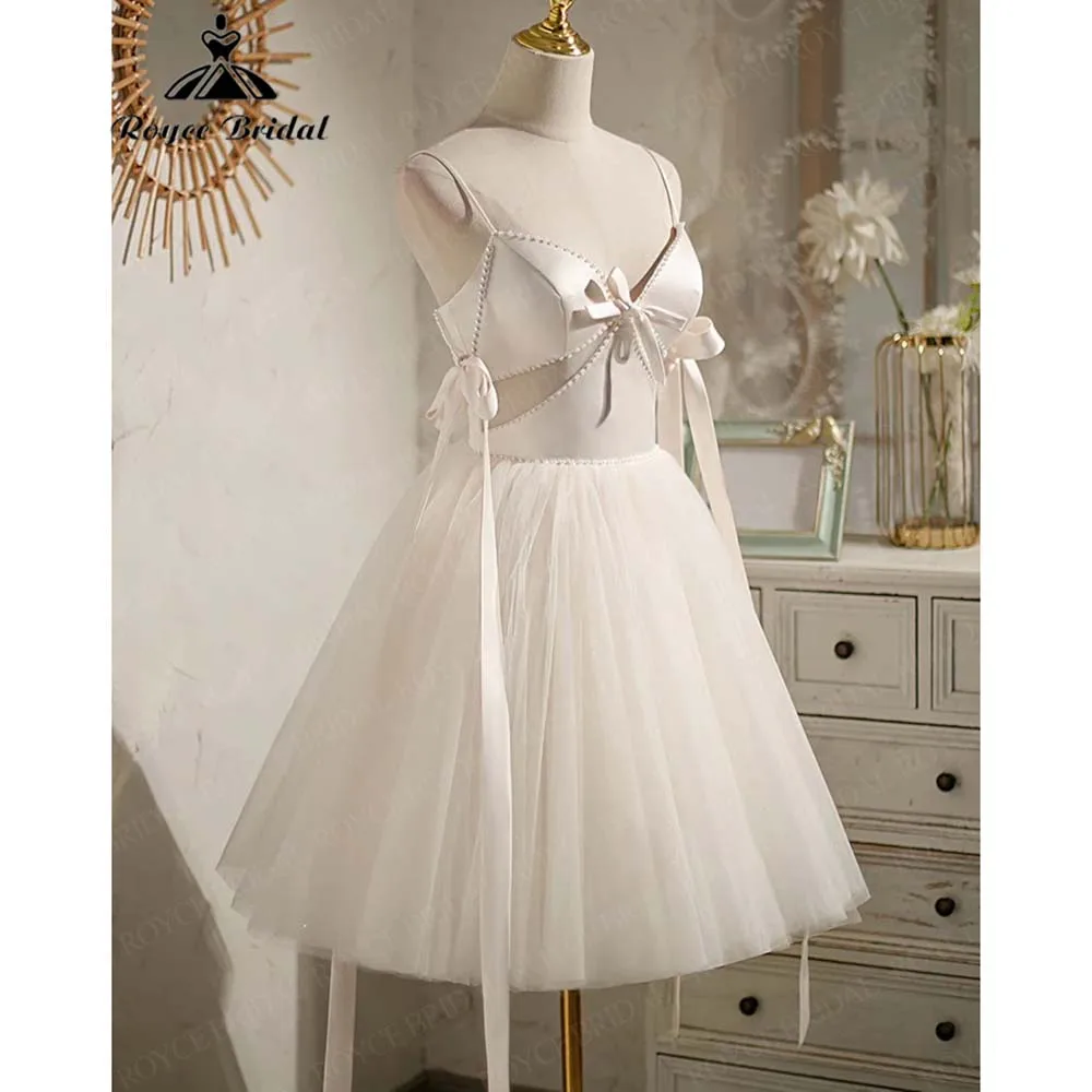 

Элегантное короткое платье на тонких бретельках с бантом для встречи выпускников 2026 Милая пышная тюлевая юбка Вечернее платье Vestidos De Festa по индивидуальному заказу